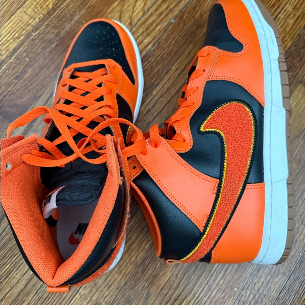 Nike Orange and Black High-Top Sneakers with Textured Swoosh